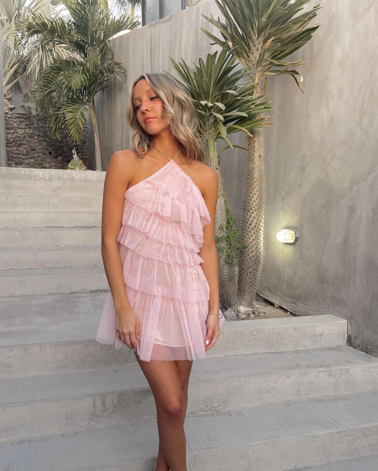 the bar pink ruffle dress the Henri gown ros on babe @noamrwellness